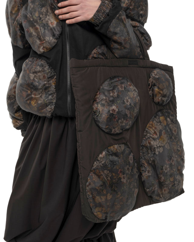 RETENTION FLOWER-TEXTURED BLACK PADDED TOTE BAG