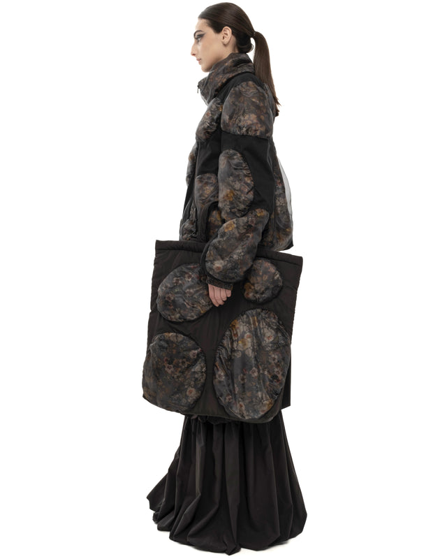 RETENTION FLOWER-TEXTURED BLACK PADDED TOTE BAG