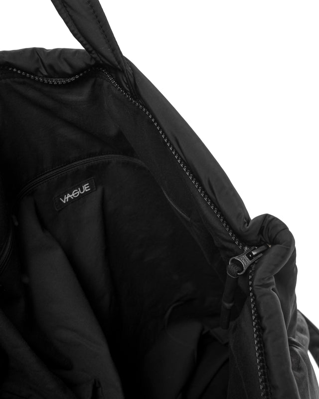 RETENTION FLOWER-TEXTURED BLACK PADDED TOTE BAG