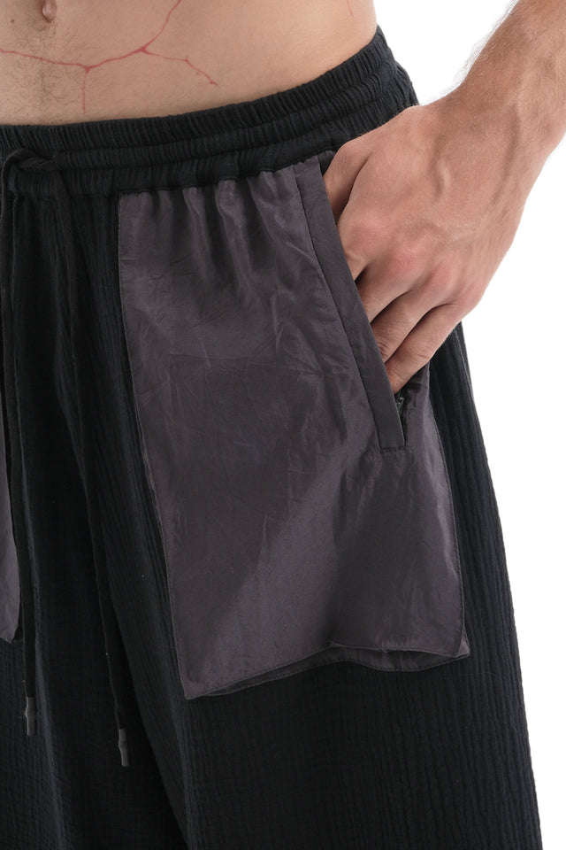 EARS TO EAR(TH) BLACK WIDE-LEG TETRA PANTS